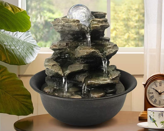 Small indoor desk fountain with cascading water flow