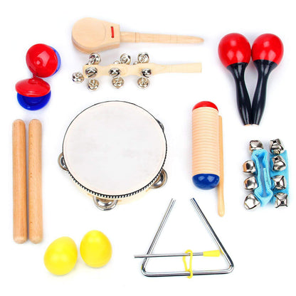 Children playing with wooden maracas and tambourine