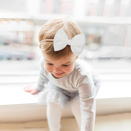 white Baby Bow Headband – Comfortable & Stylish for Infants and Toddlers